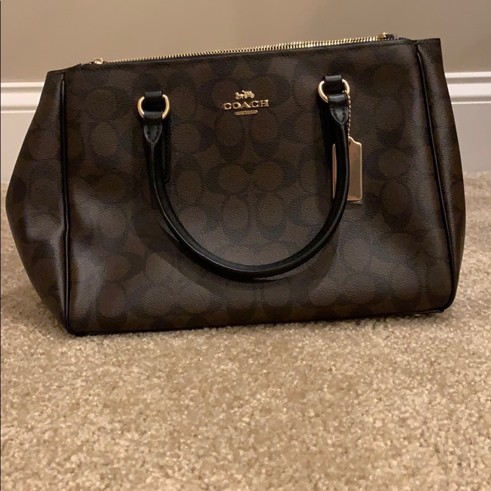 Authentic COACH purse with tag.